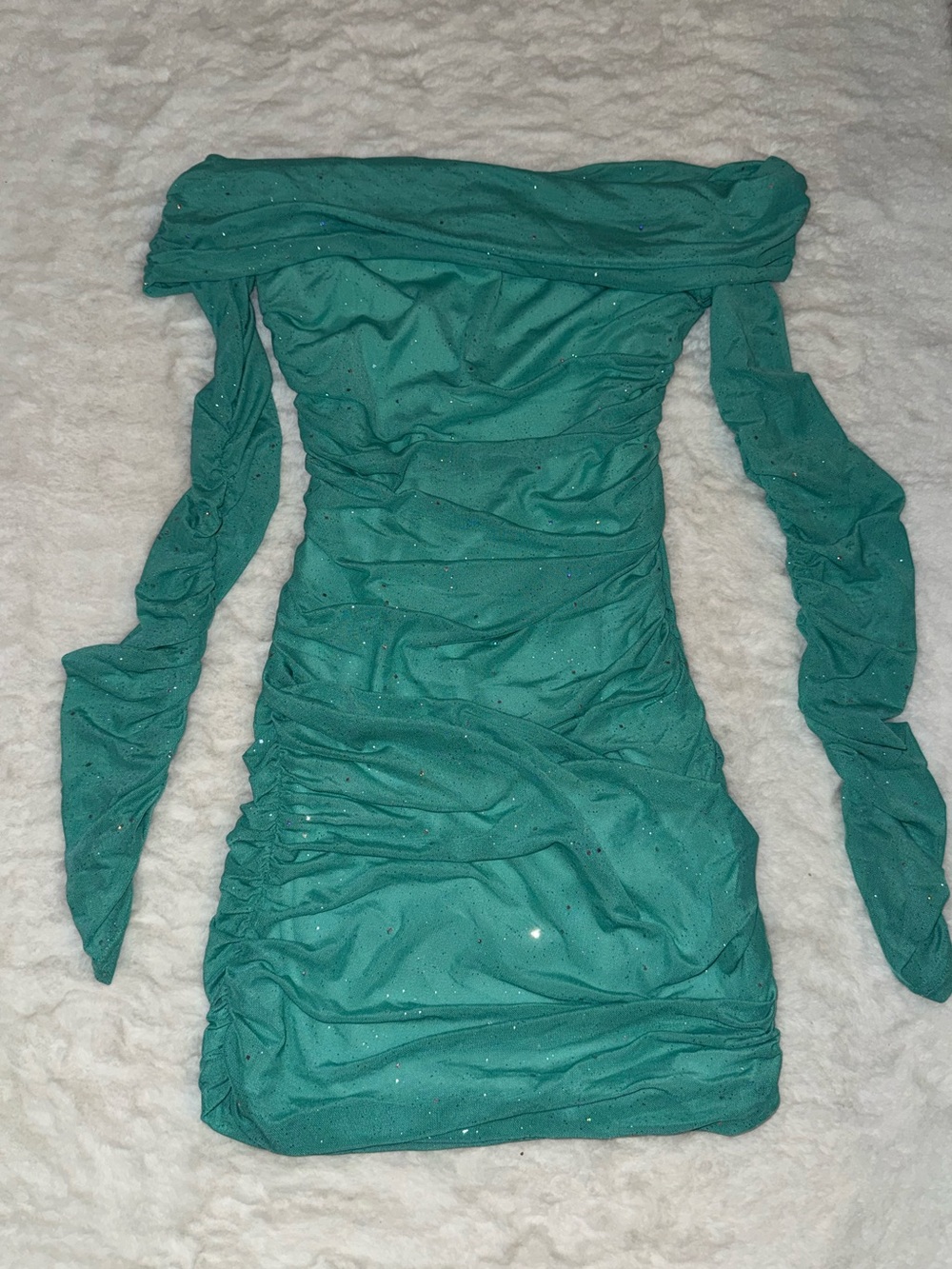 teal glitter off the shoulder mini dress